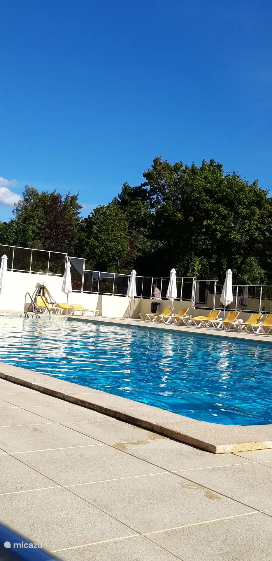 Free sunbeds and parasols by the lovely swimming pool