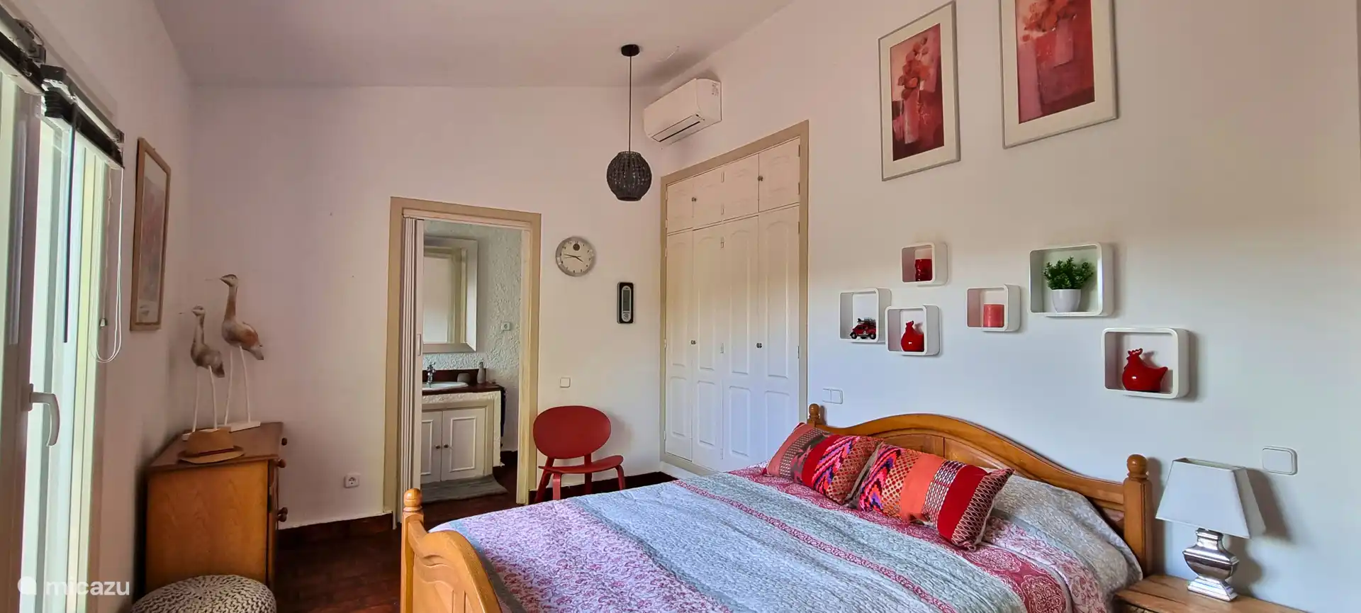 Bedroom and bathroom of the apartment.
