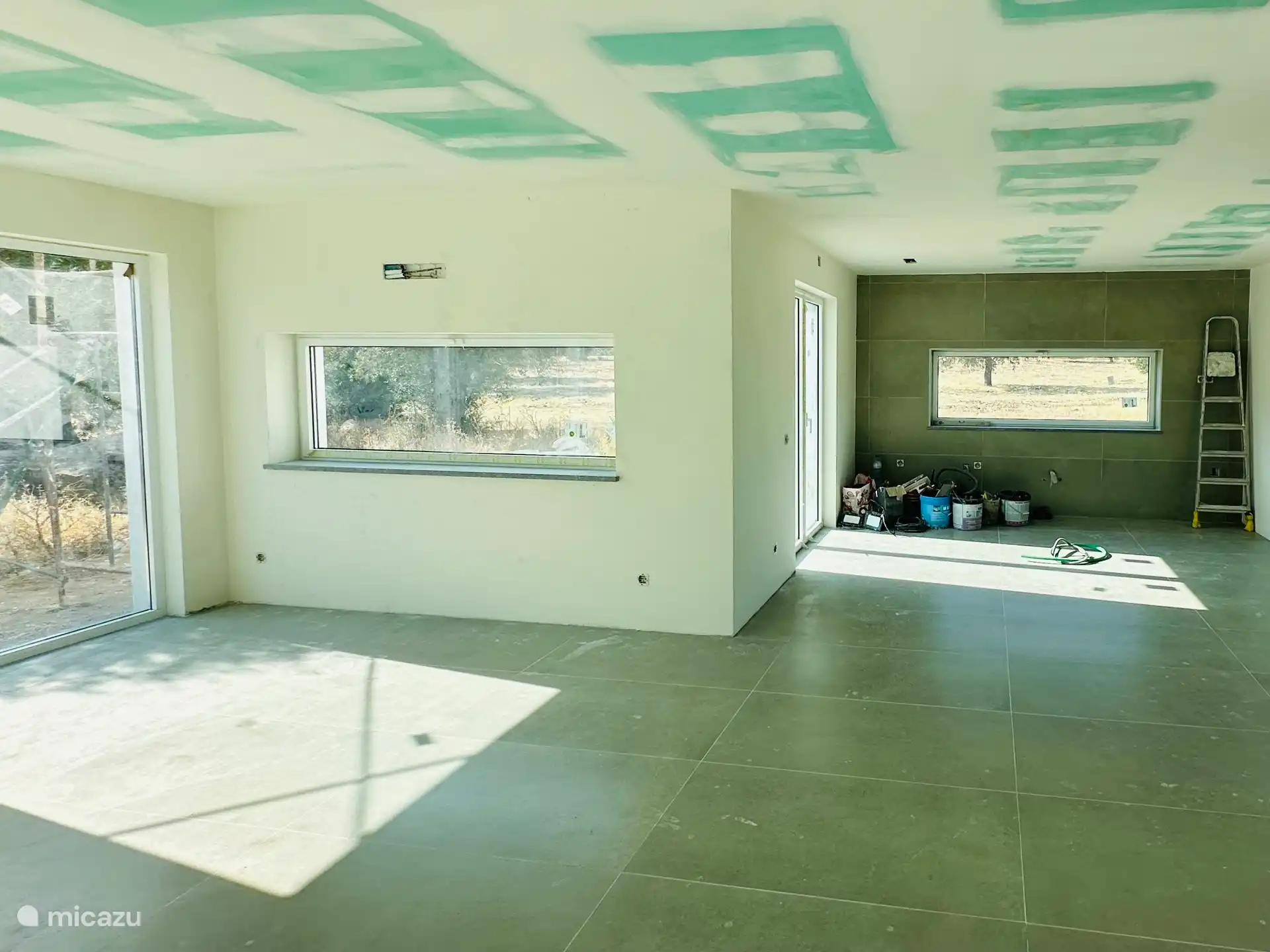 The kitchen will be in the back right