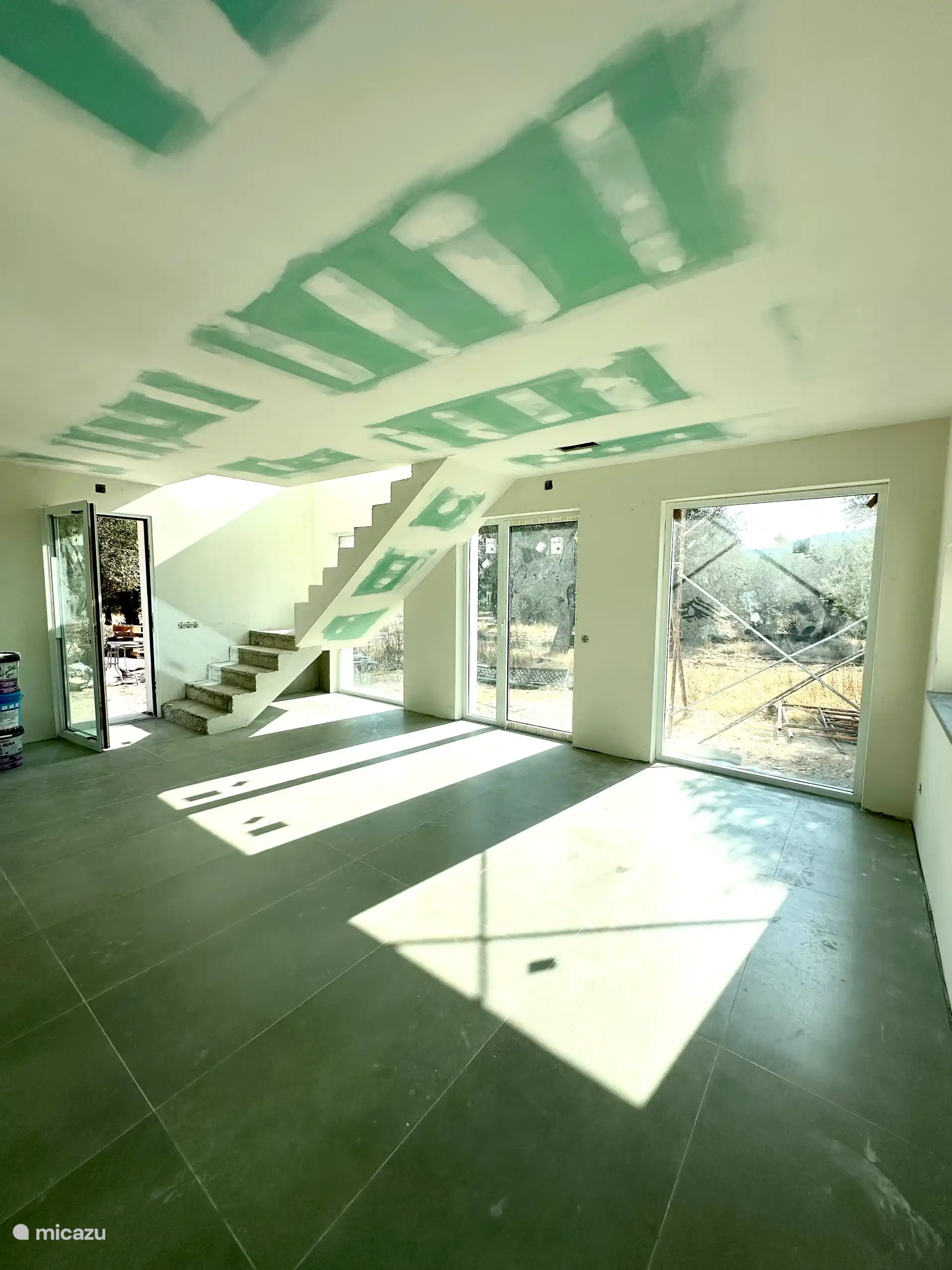 Living room with open staircase