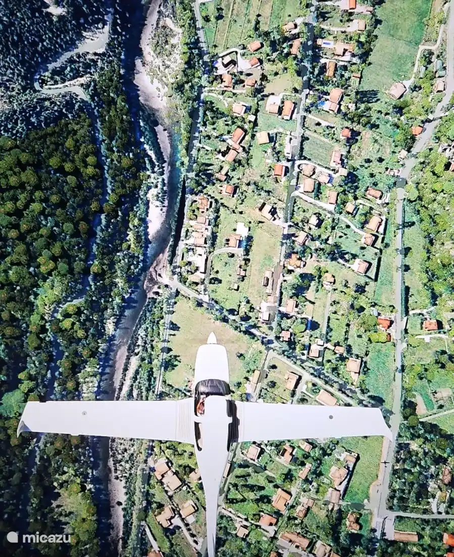 Villa + surroundings + river from the air.