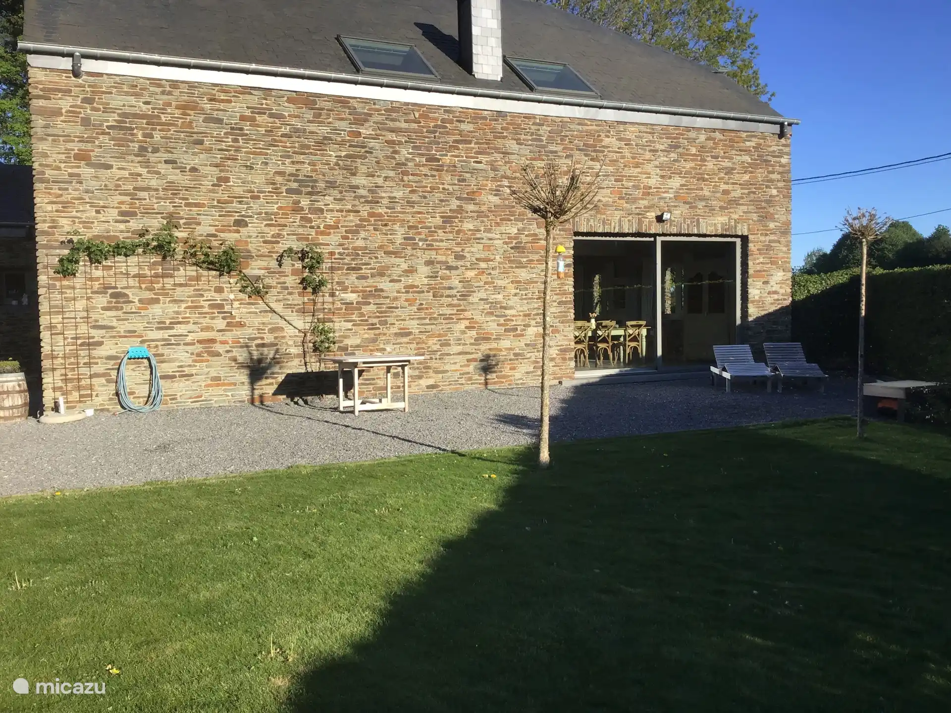 Zijgevel met zuid-west terras van 130m2