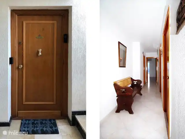 Acheter une penthouse | Espagne, Costa Blanca, Benidorm - Penthouse de luxe en bord de mer 2x terrasse sur le toit La porte d’entrée du penthouse et le hall avec accès aux 3 chambres et à la salle de bain (à la fin vue sur la mer et la terrasse avant)