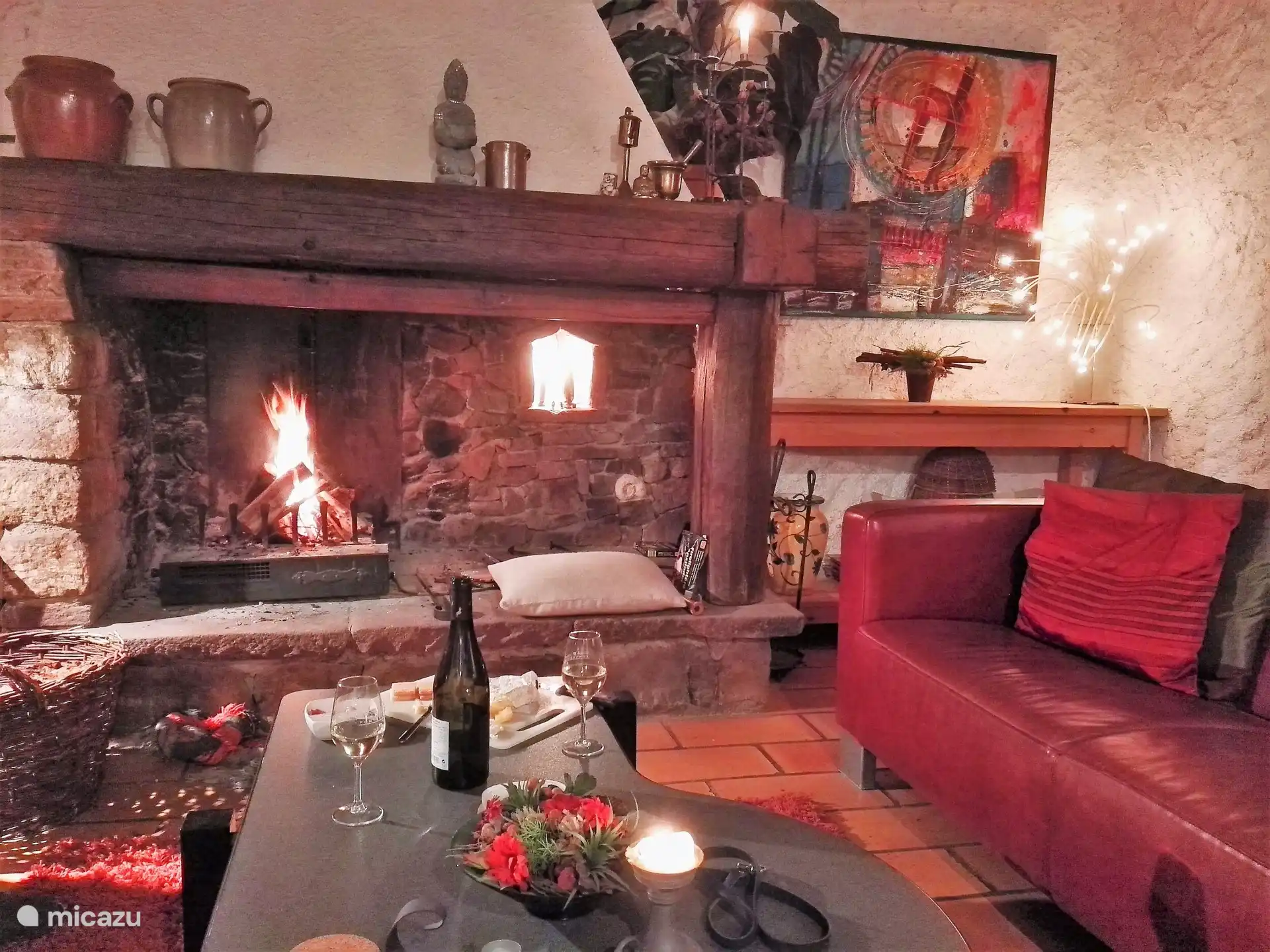 Rustic fireplace with beams..