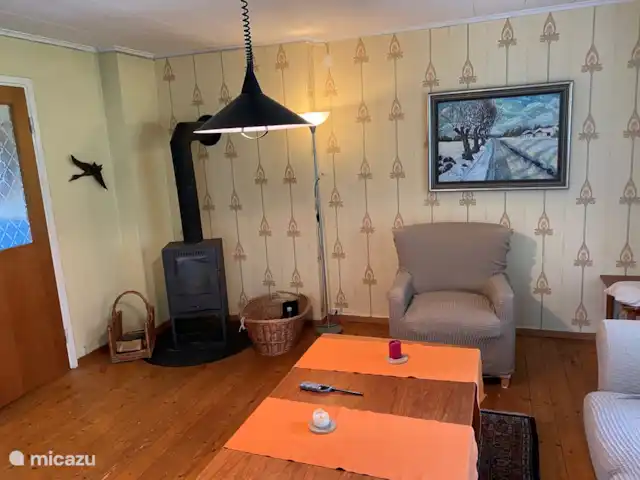 Colline des bouleaux | Suède, Värmland, Sunnemo - gîte / cottage Une partie du salon à côté du poêle