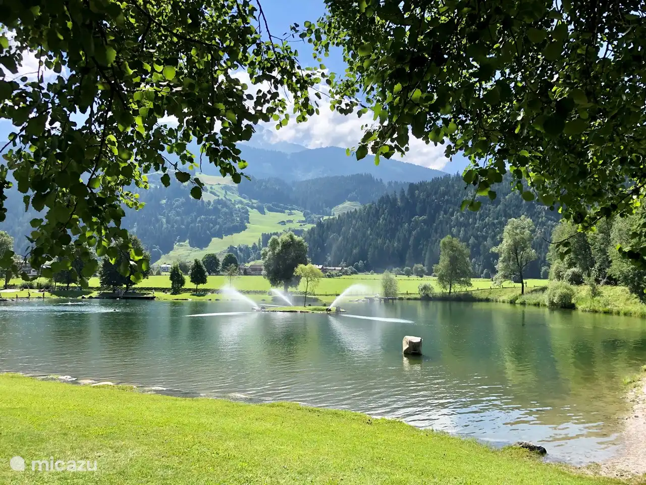 The natural swimming lake in Hollersbach, located right next to the valley station of the gondola. For the children there is plenty of fun, a beach with a pirate ship, a cable car over the water, slides.