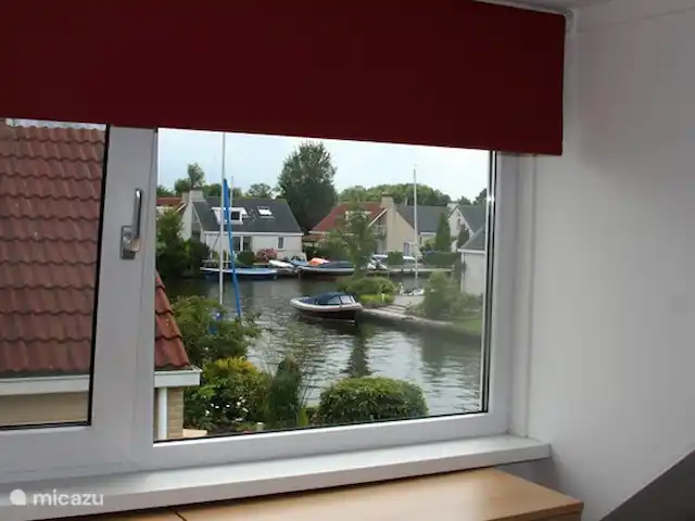 Maison de vacances Markant | Pays-Bas, Frise, Balk - maison de vacances Ce joli coin dans la chambre des maîtres offre une belle vue sur l'eau.