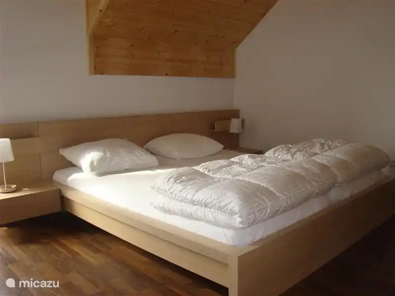 Bedroom with 2 bed (1.80x2.00 m) and large wardrobe. This room has a door to the lovely balcony which is located on the south side.