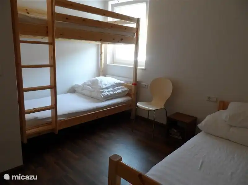 Bedroom 3 with bunk bed with trundle.