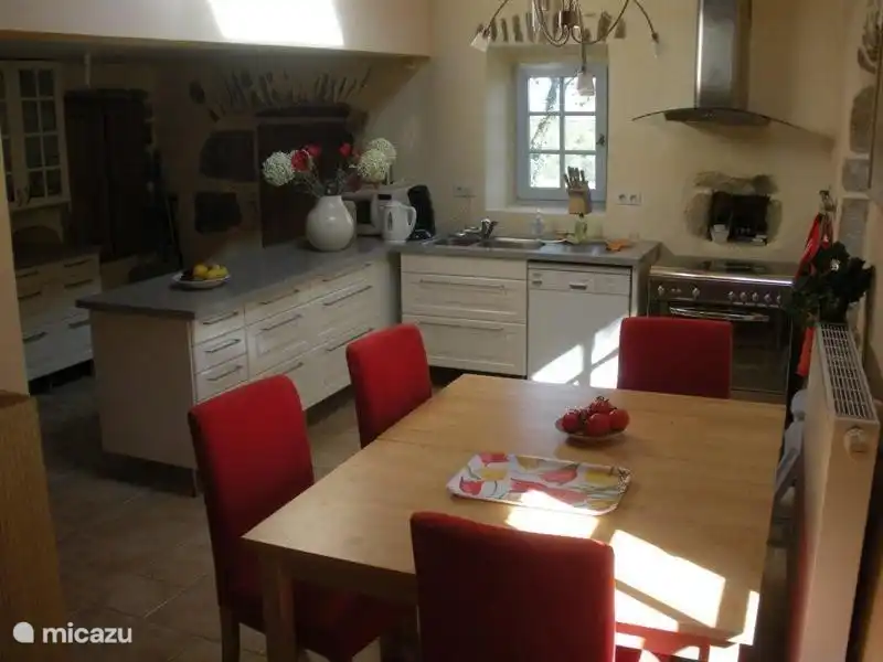 the kitchen with worktop and sink and dining area