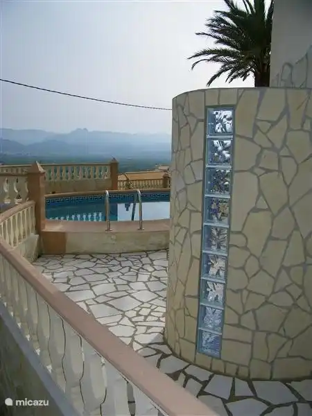 Outdoor shower to use before and after swimming.