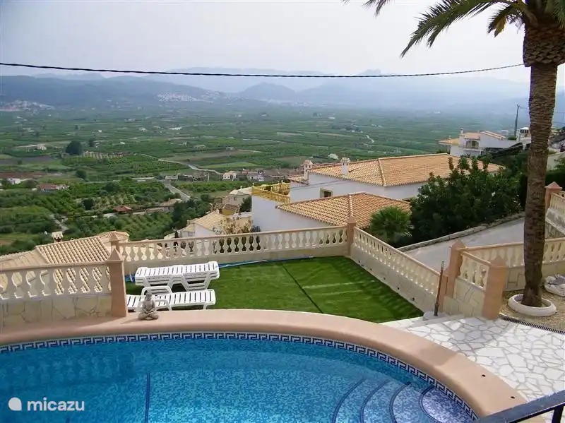 Stunning view over the valley with swimming pool +/- 8m x 4m partly 2m/1.2m deep with stone steps