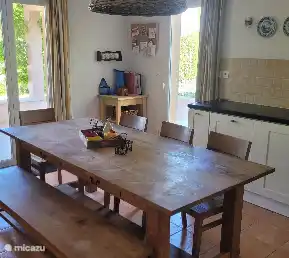 Kitchen with patio doors and door to the terrace.