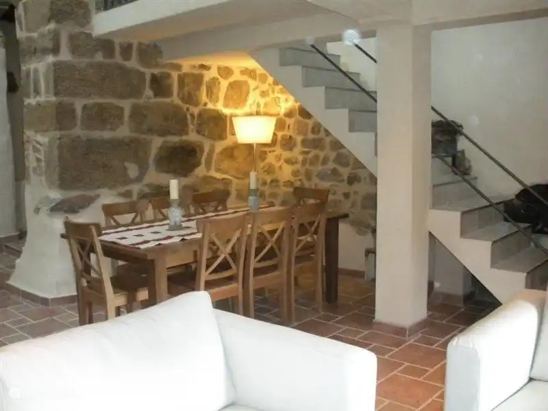 The dining area with extendable table; there are 8 chairs.