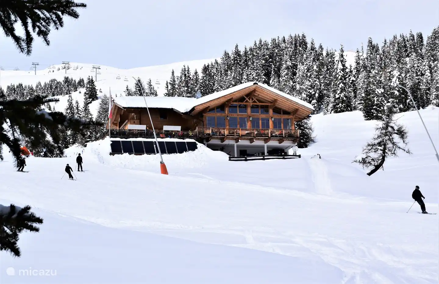On the terrace of this Mecki's restaurant, along the ski slope in Lienz, you have a wonderful view of the Italian Dolomites.