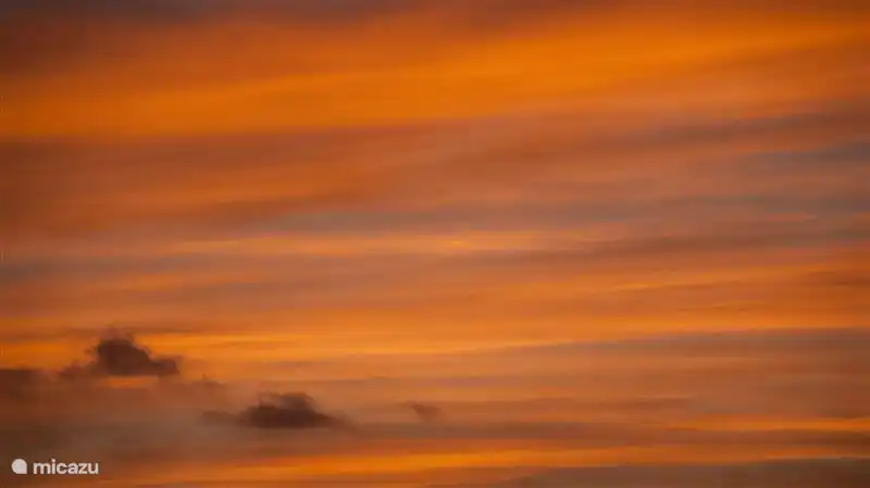 ¡Disfruta de la puesta de sol en la terraza de la azotea!