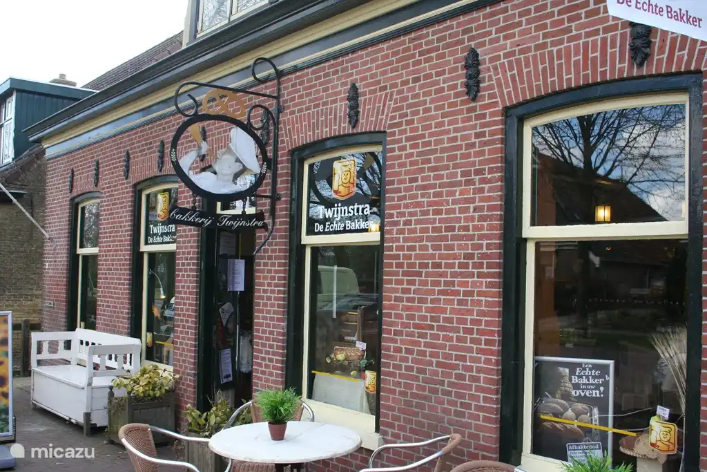 Die Feuerstelle. Barbeque auch als Hintergrund der Essbereich.