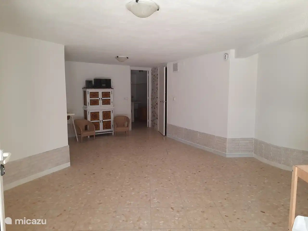 Downstairs area with 2 bedrooms and a bathroom