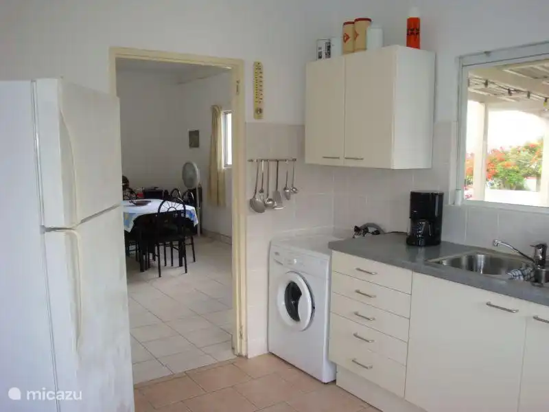 Kitchen with washing machine.