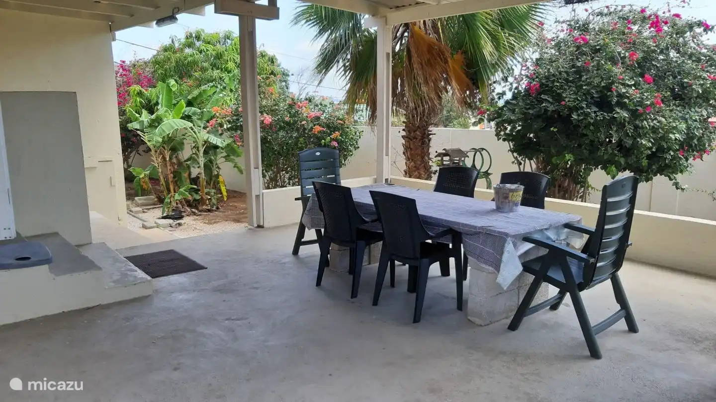The covered and illuminated terrace. Here you'll probably spend more time than in 

the living room or dining room. Good for breakfast, drinks, barbecue.