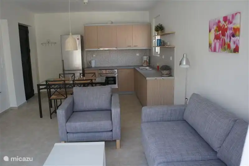 The lounge is modern and decorated with light colors. There is a flat screen TV with satellite receiver and wireless internet (WIFI).