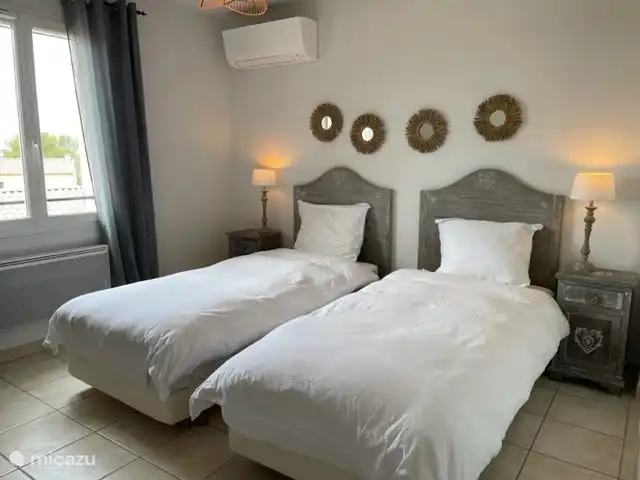 Bedroom 3 on the first floor has air conditioning.
Plenty of wardrobe space and a dressing table with drawers.