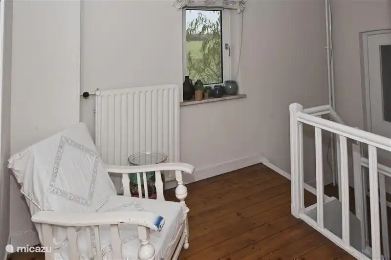 Through the wide staircase and a landing, one arrives at the first floor where two bedrooms and the bathroom is located.