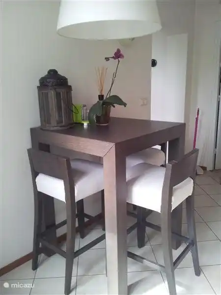 Tall kitchen table with high chairs for kitchen good day to start.