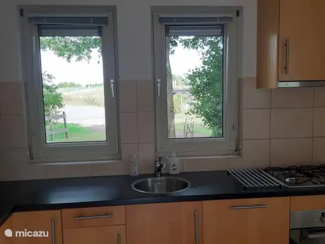 vista al campo en Países Bajos, Frise, Sint Nicolaasga - casa vacacional