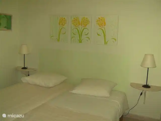 This is one of 3 cozy bedrooms.