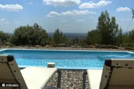 Your view from the terrace over the pool towards the Pyrenees.