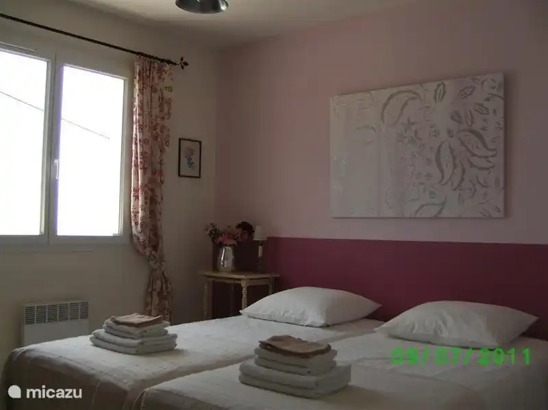 Each bedroom has its own atmosphere and double opening windows with wooden shutters and roller screens!. So your windows can be left open at night.  And there is also air conditioning. Bed size 2 x 90 x 200