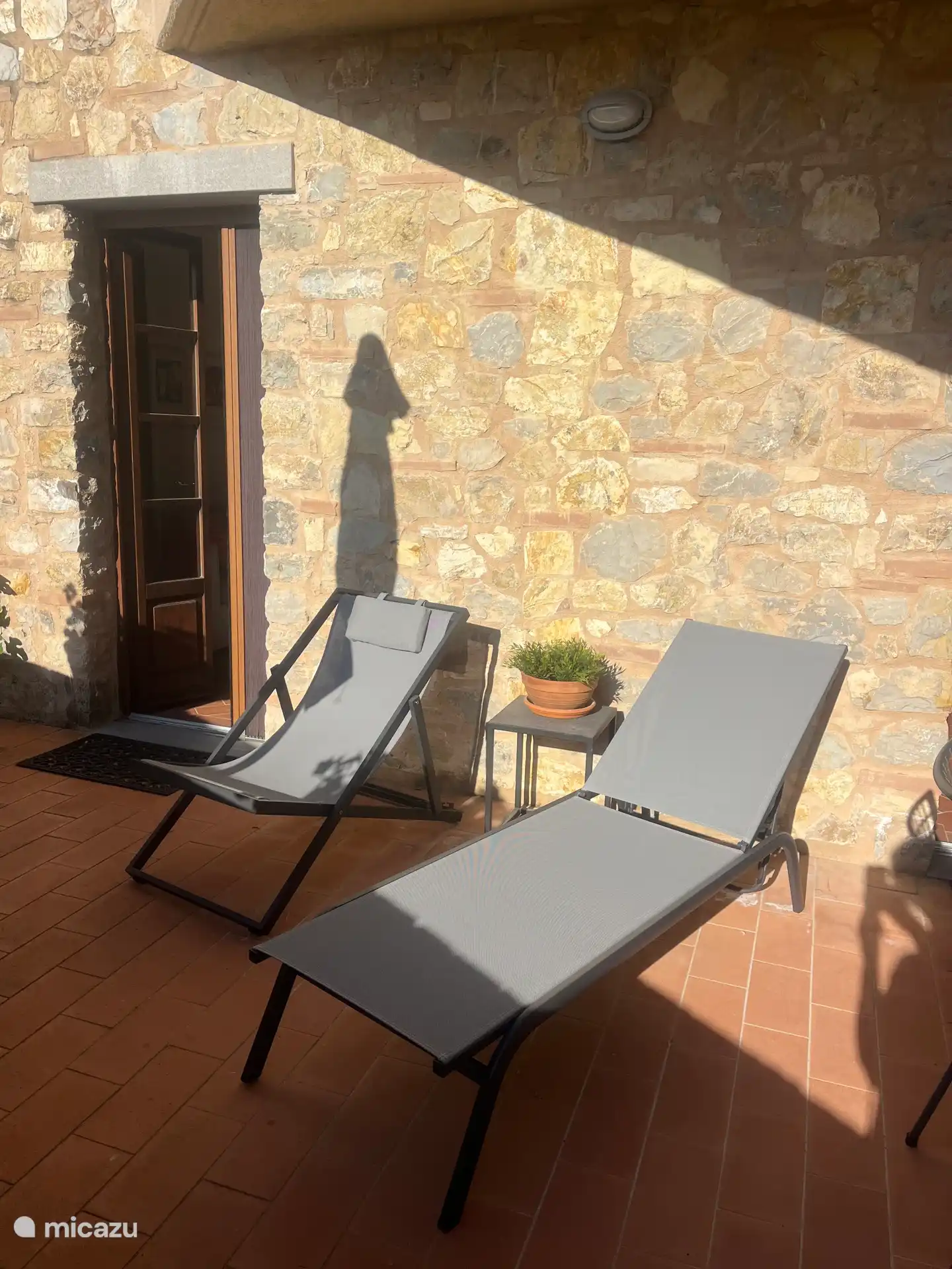 Relax on your own terrace (but similar sunbeds are also by the pool) 