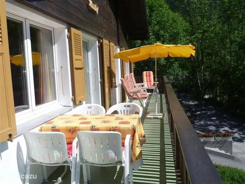 Upper part: Spacious (13m) balcony with garden furniture including sun loungers