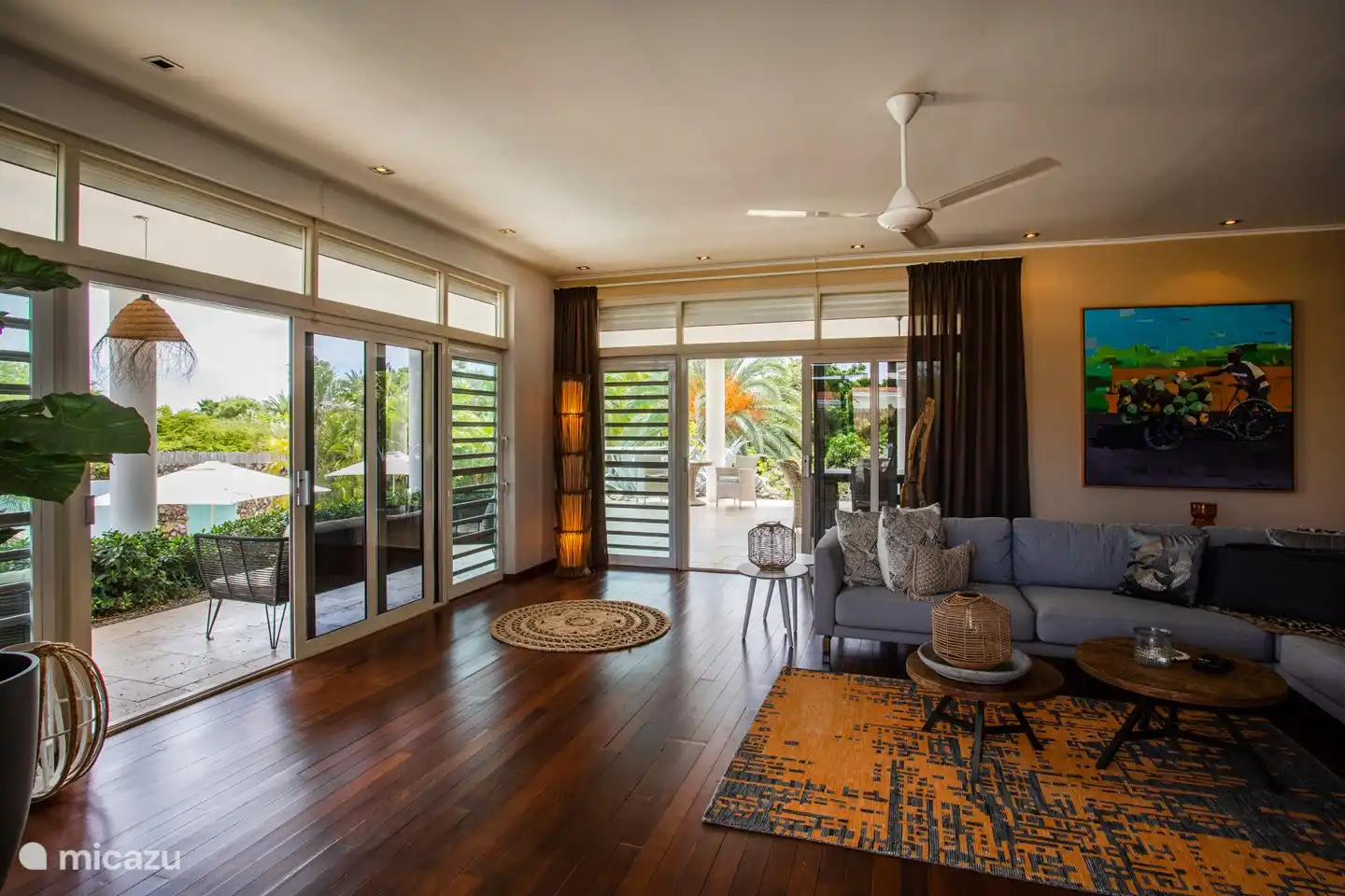 Living room with 3 sliding windows to terrace