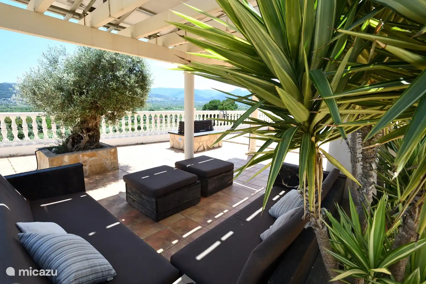 De heerlijke lounge zit met fraai uitzicht
