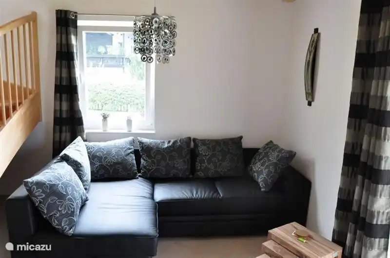 Dans le salon, le coin salon peut être agrandi en un confortable lit double spacieux.