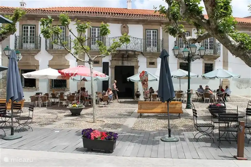 the charming village square under the plane trees in the center of Coja (5 km)