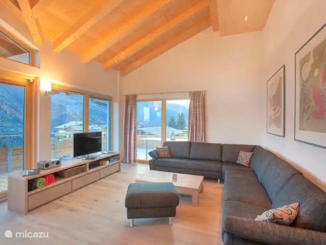 Location de Vacances Autriche, Salzburgerland, Bramberg am Wildkogel, chalet - Alpenchalet am Wildkogel - Émeraude Détendez-vous dans le coin salon spacieux.