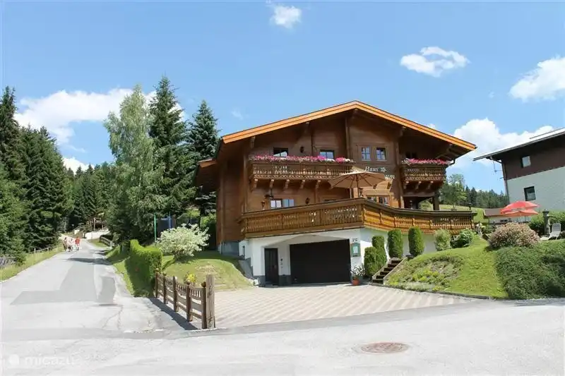 Our house in the summer, quiet and sunny location just above the beautiful mountain village of Filzmoos