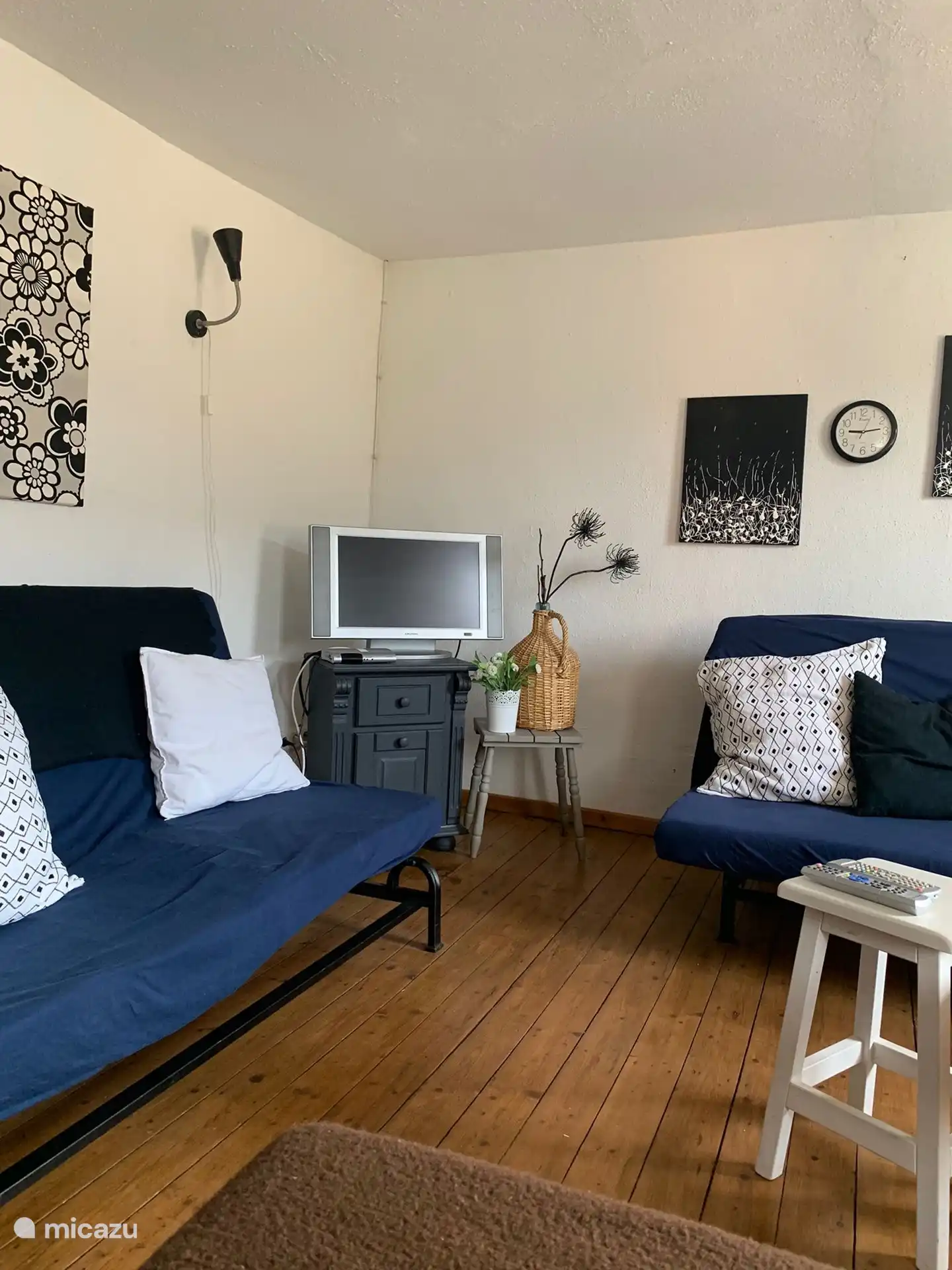 Salón con sofás cama