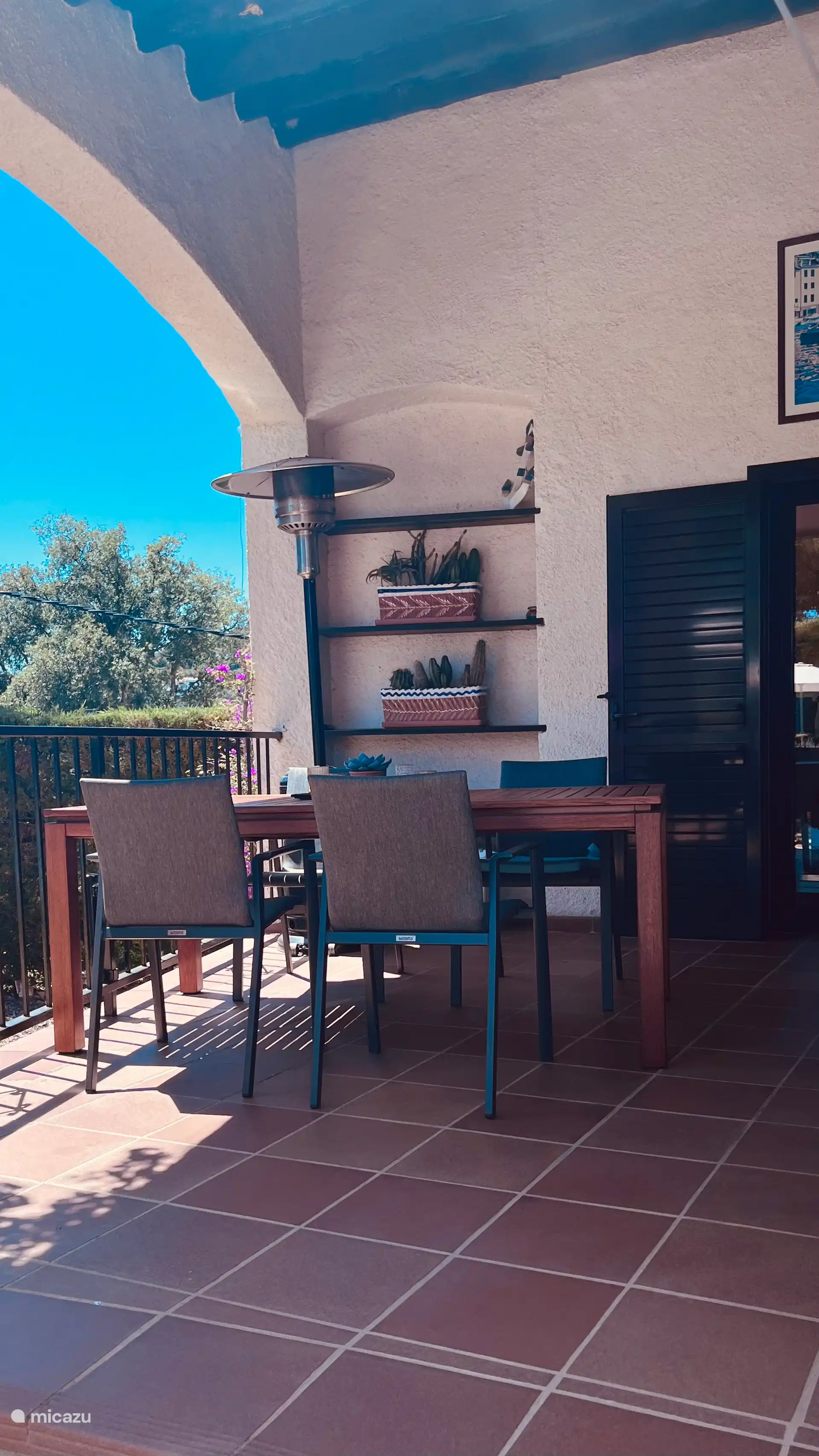 Covered terrace with patio heater for long evenings outside
