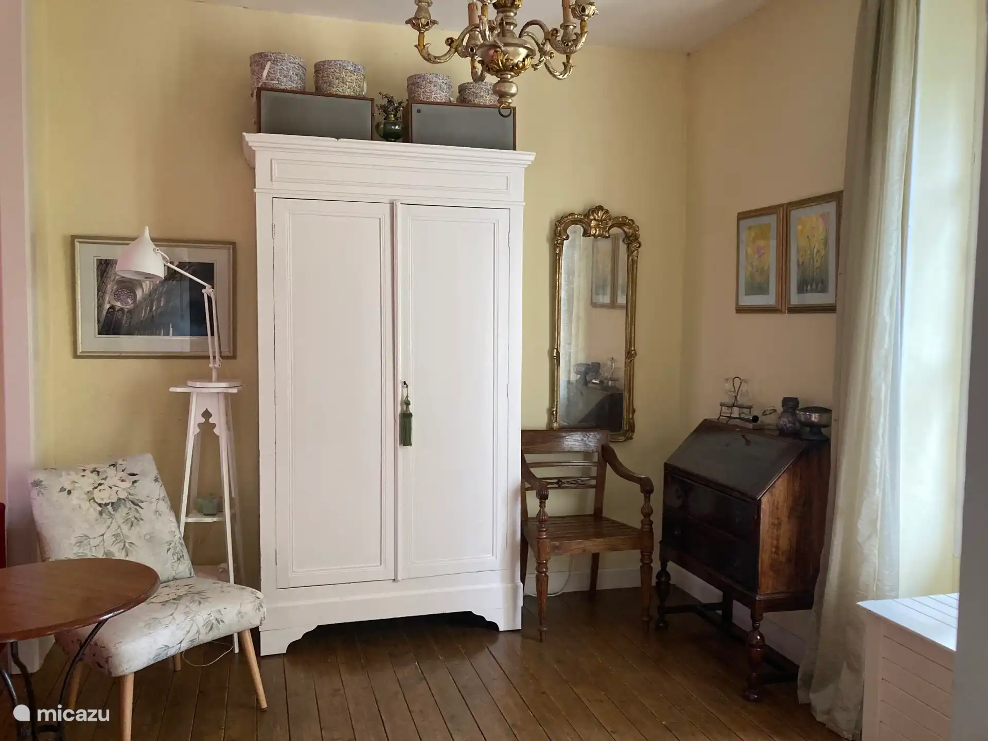 In the white cabinet in the garden room is a great vinyl collection and record player