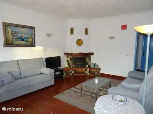 Location de Vacances Portugal, Algarve, Albufeira, maison de vacances - Quinta Elisabeth Cosy ensemble autour du grand poêle à bois.
