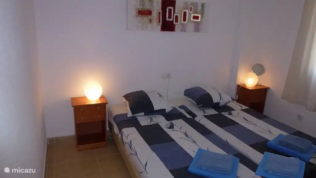 Schlafzimmer auf der Terrassenseite