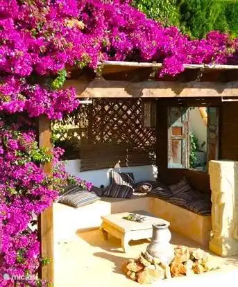 gemütliche Kuschelecke mit mexikanischen Kamin und Meerblick