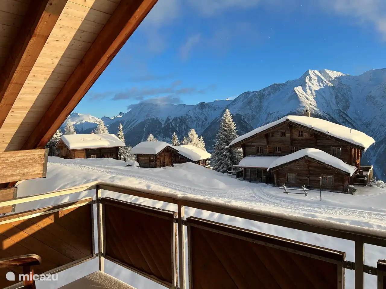 The balcony on the top floor on the south side.