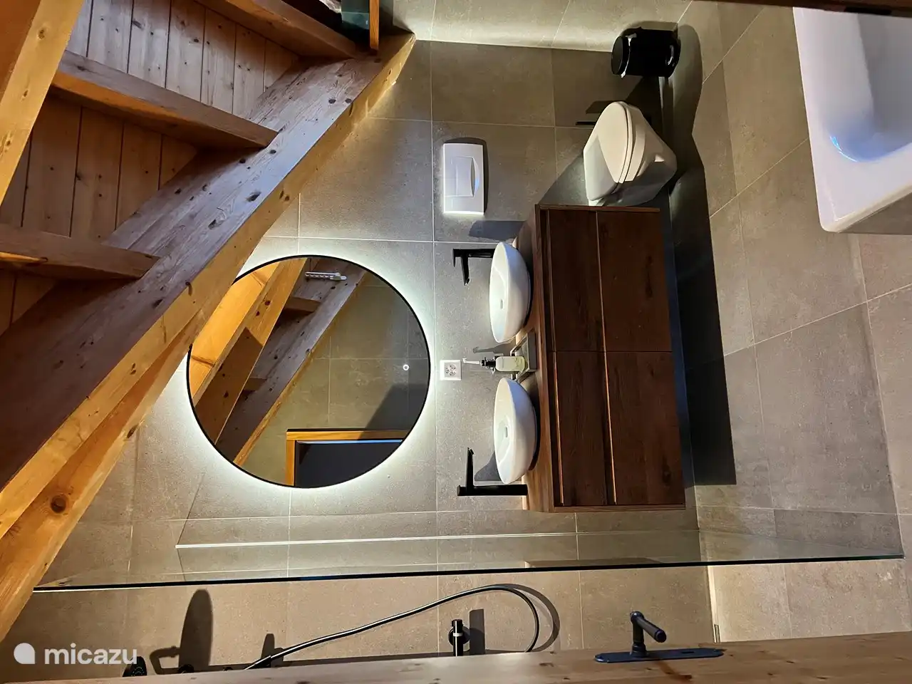 Large bathroom adjacent to large bedroom on 1st floor