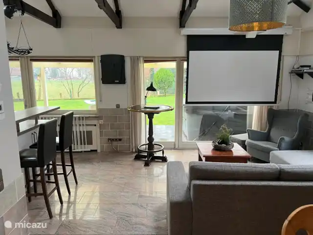 vakantiehuis huren in Duitsland, Nedersaksen, Itterbeck – Beltvilla 'Haus an der Heide' Woonkamer met uitzicht op de weilanden