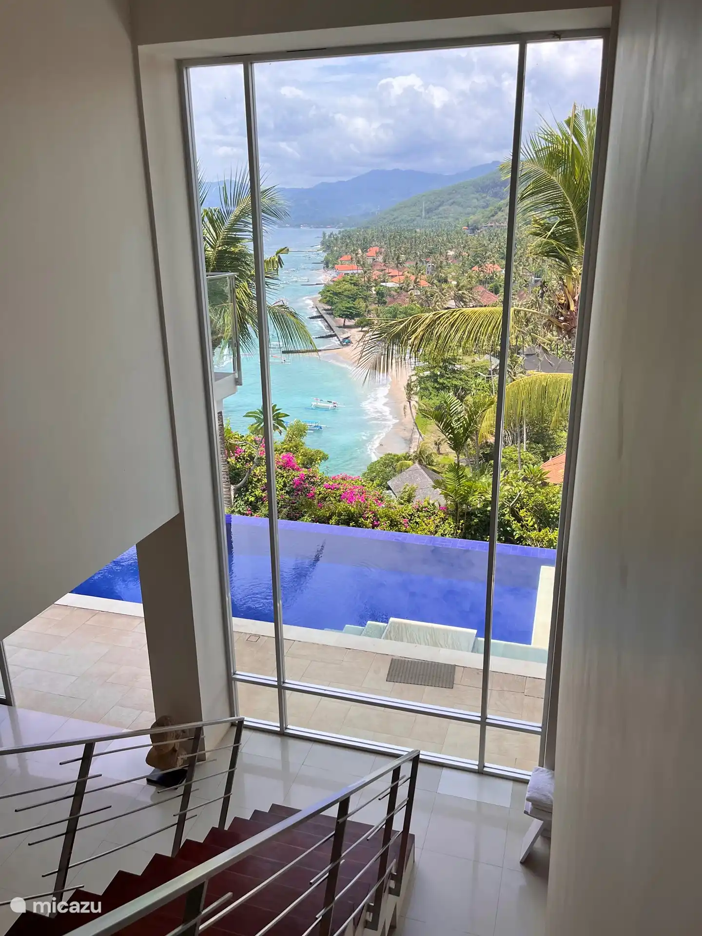 The stairs down overlooking the pool and bay